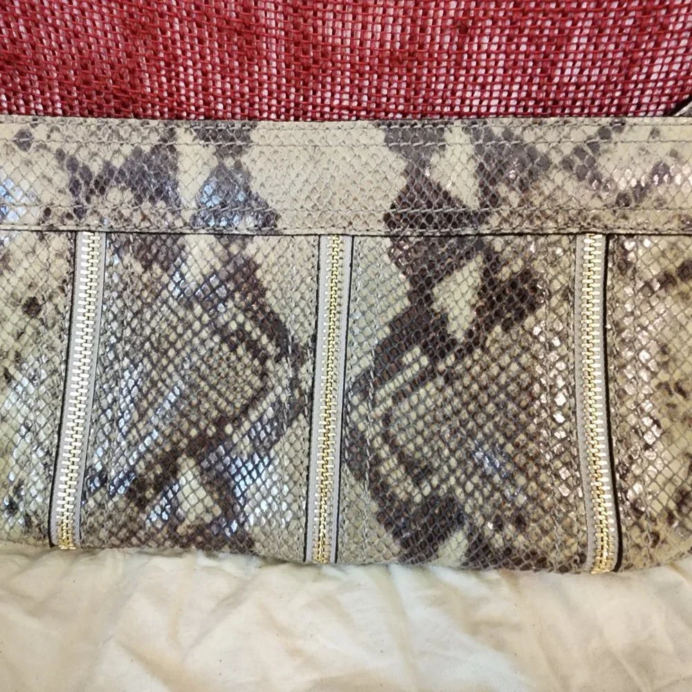 Michael Kors faux animal print clutch with‎ storage bag
